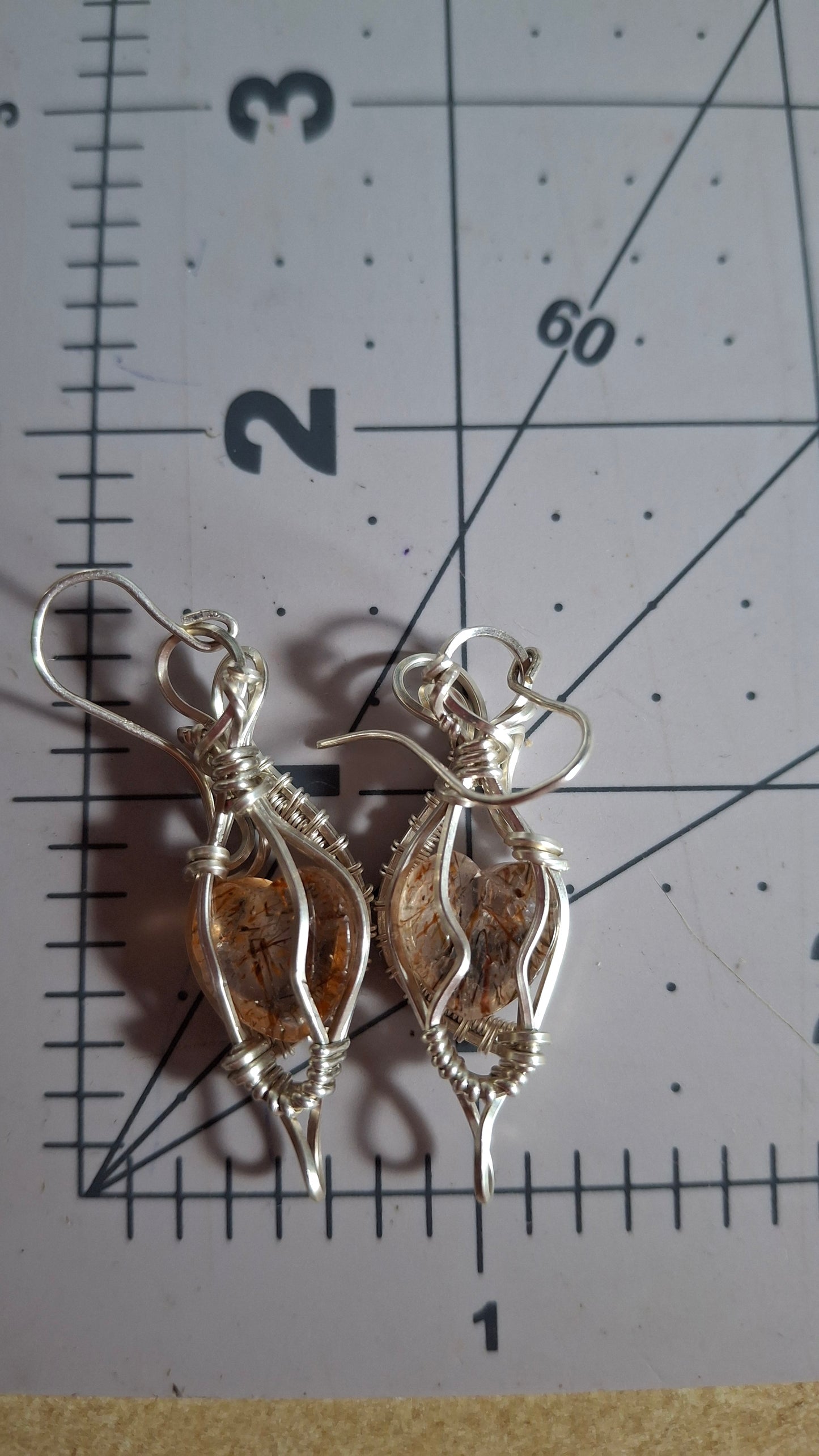 Bronze rutile hearts